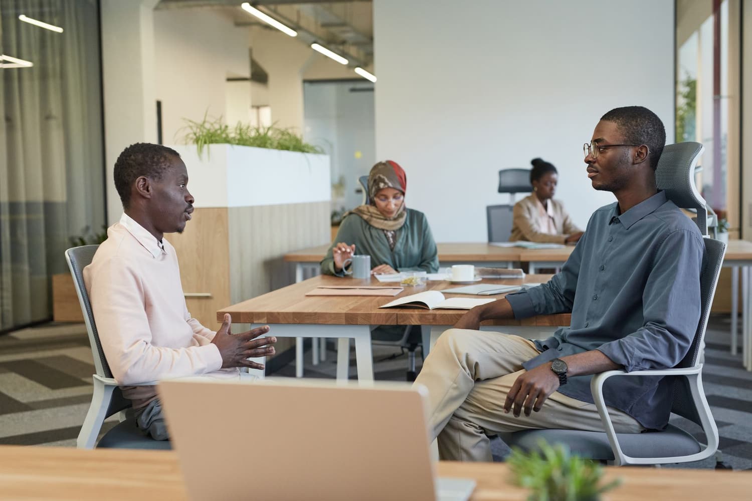 Colleagues collaborating in an office